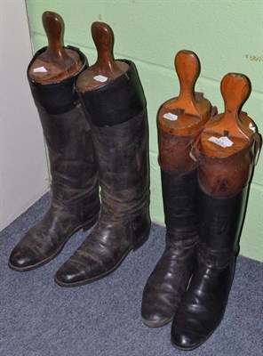 Lot 123 - A pair of black leather hunting boots and wooden trees, and another pair with brown tops