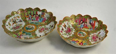 Lot 137 - A Cantonese famille rose dish with shaped edge decorated with figures and birds and another similar