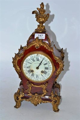 Lot 147 - A French Louis XV style mantel clock, the enamelled dial inscribed 'Elkington'