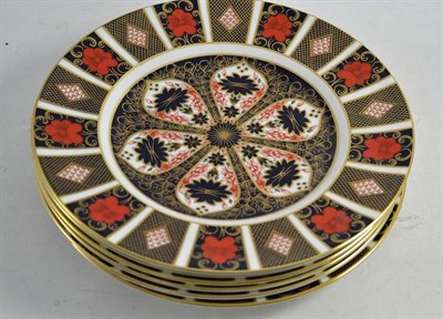 Lot 181 - A set of six Royal Crown Derby 1128 Imari pattern dinner plates, 27cm