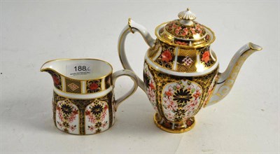 Lot 188 - A Royal Crown Derby Imari pattern 1128 teapot and milk jug