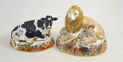 Lot 195 - Two boxed Royal Crown Derby paperweights with gold stoppers - Lion and Friesian Cow 'Buttercup'