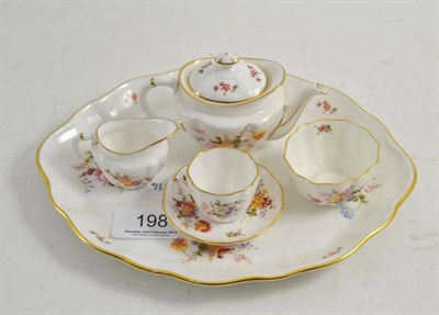 Lot 198 - A Royal Crown Derby 'Derby Posies' pattern miniature morning tea service