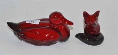 Lot 199 - A Royal Doulton flambé duck, signed Noke, 20cm long and a flambé fox