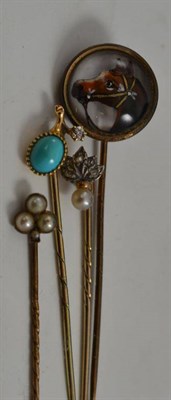 Lot 201 - Diamond and turquoise stick pin and three others