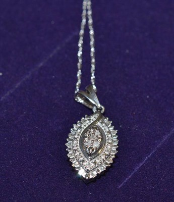 Lot 202 - A 9ct white gold diamond cluster pendant on chain