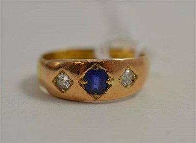 Lot 212 - A 22ct gold sapphire and diamond ring