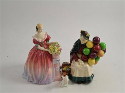 Lot 254 - Two Royal Doulton figures 'The Old Balloon Seller' HN1315 and 'Roseanna' HN1926 and a Royal Doulton