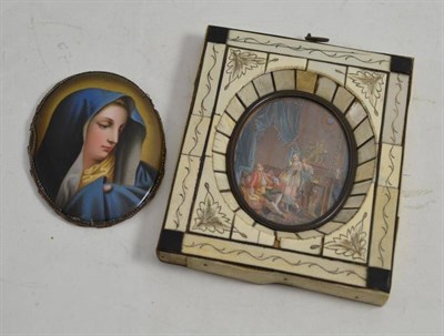 Lot 258 - A painted porcelain plaque of the Virgin Mary and a miniature in a keyed ivory frame