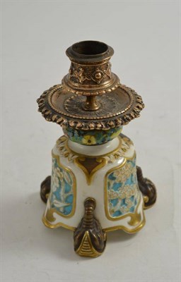 Lot 261 - A Royal Worcester aesthetic movement candlestick with gilt metal mounts