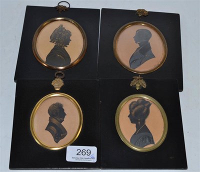 Lot 269 - Four 19th century silhouette portraits with gilt decoration