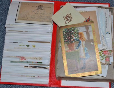 Lot 275 - An album and box of decorative greetings cards and postcards including early Mickey Mouse