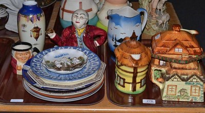 Lot 278 - Four pieces of Cottage Ware, Pickwick Teapot, eight plates, a jug and a vase (on two trays)