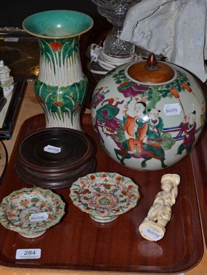 Lot 284 - A Chinese jar and cover with hardwood stand, a pair of Chinese porcelain patch stands, a...