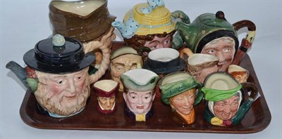 Lot 293 - Twelve assorted Beswick and Royal Doulton character jugs and teapots