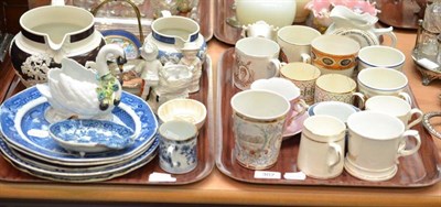 Lot 307 - Two trays of decorative ceramics including pearlware plates, commemorative mugs, encrusted swan...