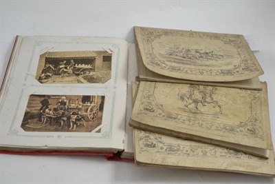 Lot 313 - A set of four early 19th century writing exercise books, a postcard album, a Steven's Queen...