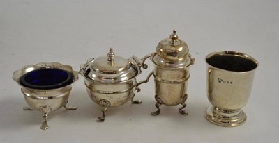 Lot 325 - Three silver condiments and an egg cup