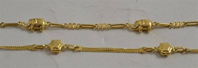 Lot 336 - An elephant bracelet stamped '750' and a fancy link bracelet (a.f.)