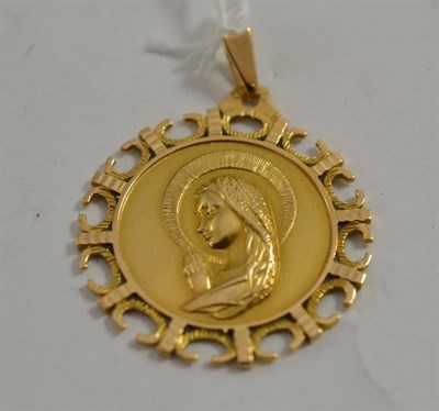 Lot 339 - A yellow metal pendant of the Madonna