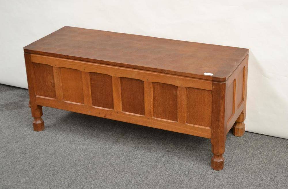 Lot 717 - A Robert  "Mouseman " Thompson Oak Blanket Box, on front turned octagonal legs, with carved...