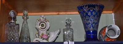 Lot 346 - A blue overlay glass vase (a.f.), a Dresden Rococo porcelain clock, a porcelain cornucopia, a...