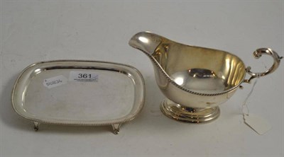 Lot 361 - Silver sauceboat, William Hutton & Son, Sheffield 1934 and an electroplated teapot stand