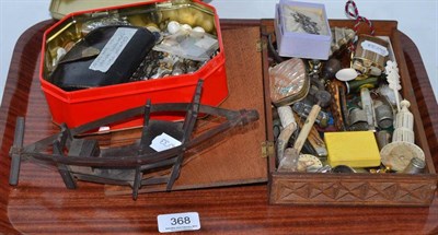 Lot 368 - A tray of collectables including steel nutcrackers, bone and ivory sewing accessories, costume...