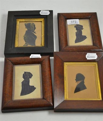 Lot 372 - Four 19th century silhouette portraits with gilt decoration