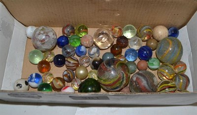 Lot 381 - A small collection of marbles