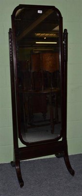 Lot 464 - A dark stained mahogany cheval glass