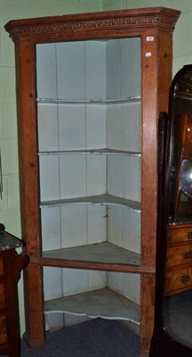 Lot 465 - A Georgian pine standing corner cabinet (lacking doors)