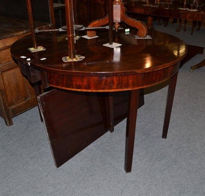 Lot 474 - Georgian mahogany D-end dining table and a leaf