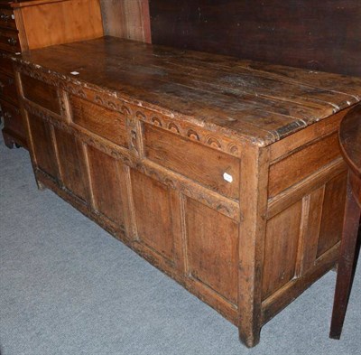 Lot 475 - A 17th century large oak linen chest initialled 'EF'