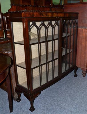 Lot 480 - A mahogany glazed bow front display cabinet