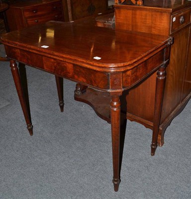 Lot 487 - An early Victorian mahogany foldover tea table