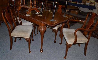 Lot 494 - Walnut dining table and six chairs