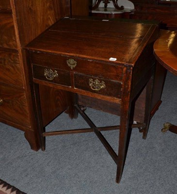 Lot 499 - An 18th century small oak desk with sloping hinged top