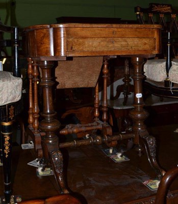 Lot 503 - A Victorian walnut sewing table