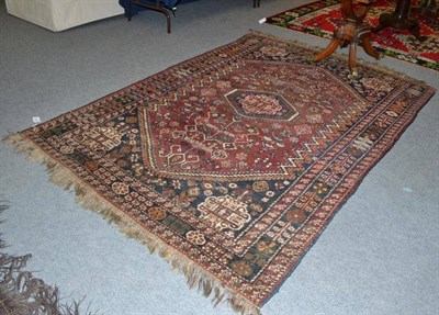 Lot 509 - A Kashgai rug South West Persia, the lozenge field with central medallion framed by spandrels...