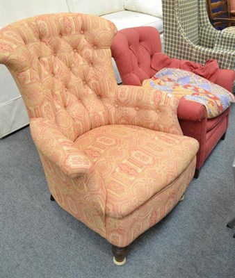 Lot 511 - A Victorian button back armchair and a similar smaller chair