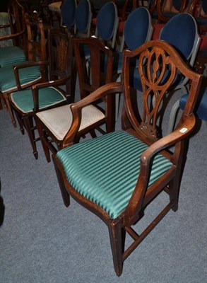 Lot 517 - Two Hepplewhite style elbow chairs and three Edwardian rosewood and mahogany salon chairs