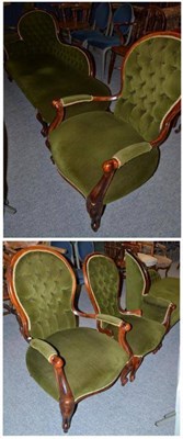 Lot 523 - A Victorian style mahogany salon suite of a chaise longue, two armchairs and a nursing chair...