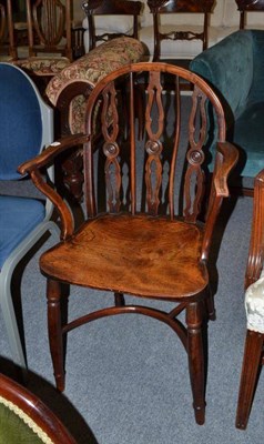 Lot 525 - A yew and elm low back Windsor chair