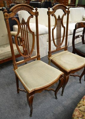 Lot 530 - A pair of walnut side chairs