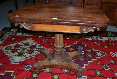 Lot 532 - William IV rosewood fold-over swivel top card table