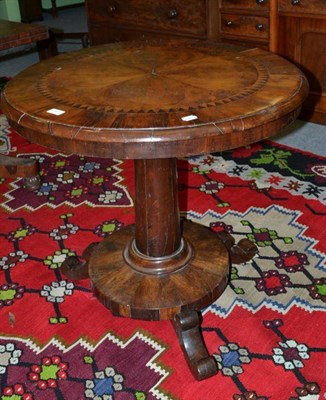 Lot 533 - A Victorian yew and walnut veneered small circular centre table