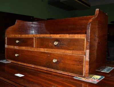 Lot 539 - A 19th century rosewood small book shelf with three drawers below