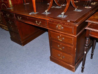 Lot 550 - An oak partner's desk