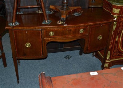 Lot 554 - A 19th century mahogany small bow front sideboard